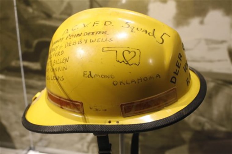 A rescuer's helmet from the 1995 Oklahoma City bombing is on display March 3 at the "Spies, Traitors and Saboteurs: Fear and Freedom in America" exhibit at the National Constitution Center in Philadelphia. The exhibit runs from March 4 to May 30. 